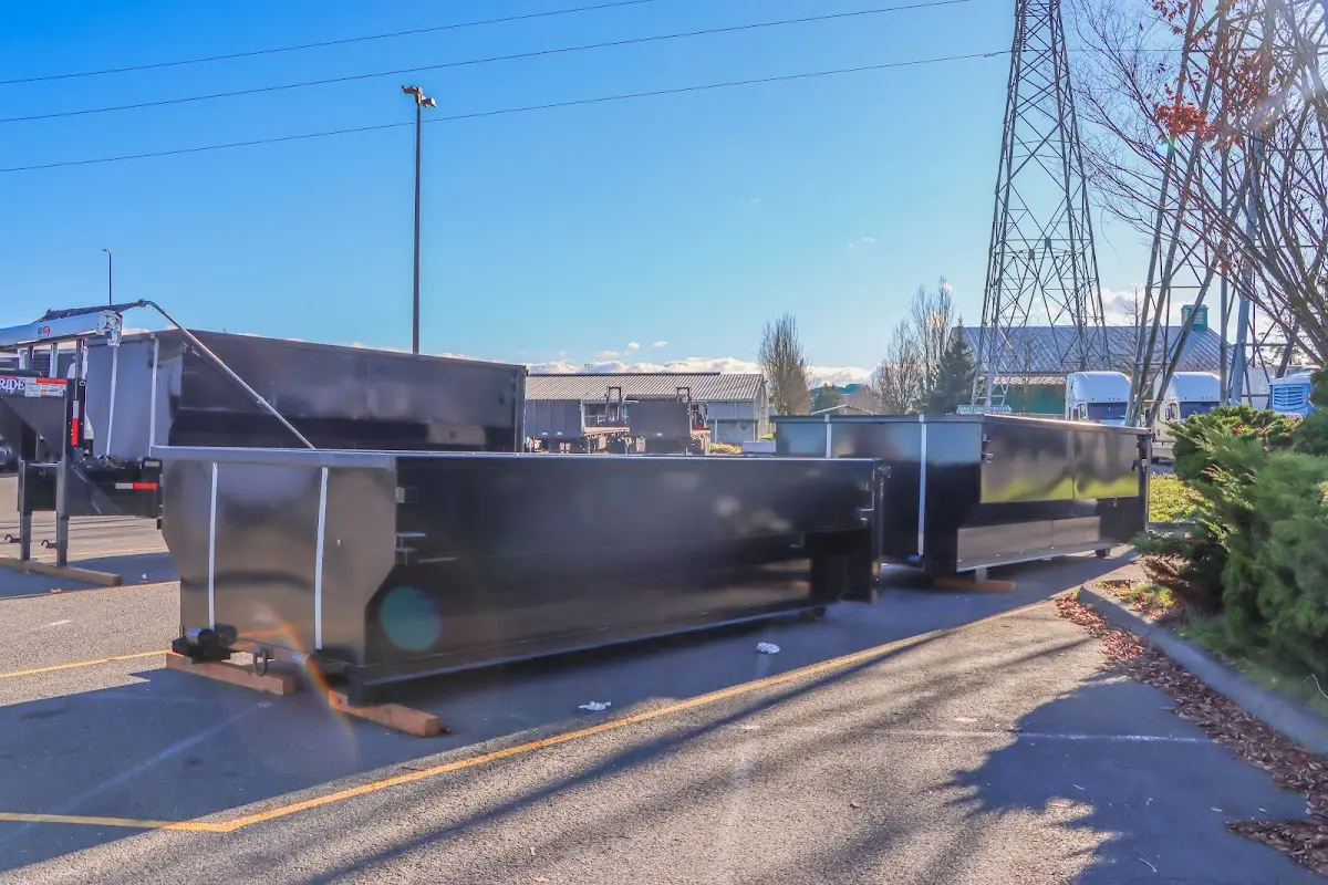 Roll-off dumpster ready for waste disposal at job site for 3 Yard Dumpster Rental in Sequim